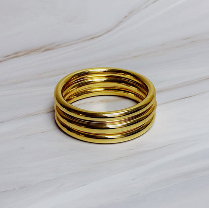 Golden Stack Luxe Bangle Set – Sleek Polished Gold-Tone Arm Candy in Classic Stacking Style